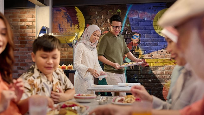 Guests enjoying kebabs at Cosmic Kebabs on the Disney Adventure cruise ship Guests enjoying kebabs at Cosmic Kebabs on the Disney Adventure cruise ship