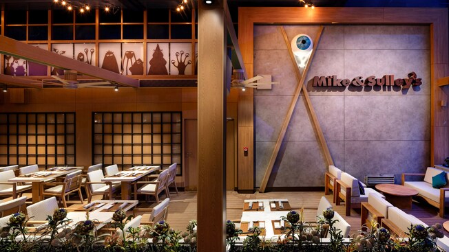 Empty tables set for dinner service at Mike & Sulley’s Flavors of Asia on the Disney Adventure cruise ship