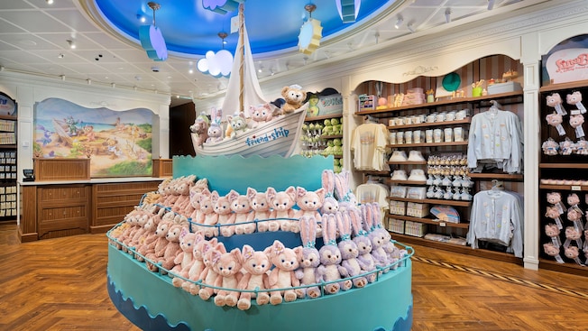 A retail display featuring a ship filled with plush toys inside the Duffy and Friends shop aboard the Disney Adventure cruise ship A retail display featuring a ship filled with plush toys inside the Duffy and Friends shop aboard the Disney Adventure cruise ship