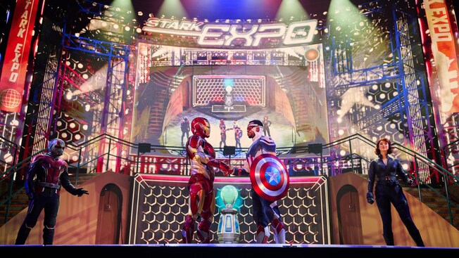 Iron Man and Captain America shaking hands during Avengers Assemble: Marvel Live Show aboard the Disney Adventure cruise ship