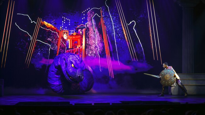 Hercules battling Hydra on stage in a performance of Disney Hercules