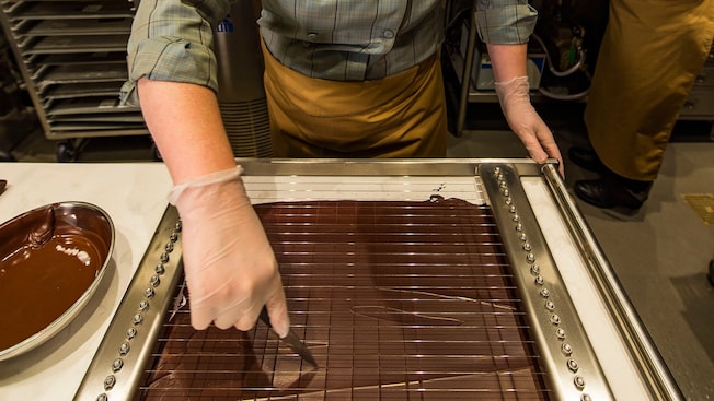 Two chocolatiers making ganache treats in the kitchen at The Ganachery