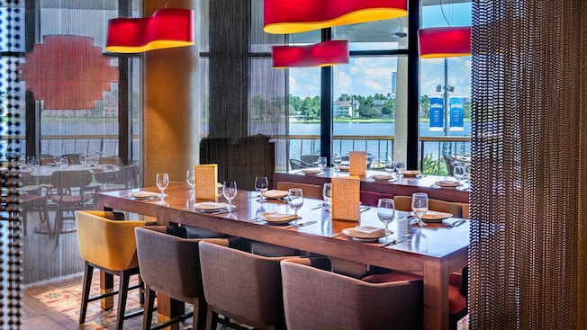 Set tables near the windows at Jaleo by José Andrés at Disney Springs