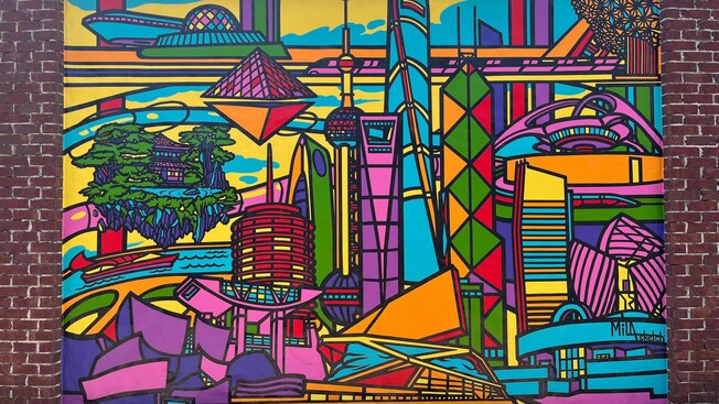 A mural featuring buildings from cities around the world
