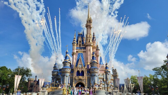 Disney Characters on stage in front of Cinderella Castle during Mickey’s Magical Friendship Faire 
