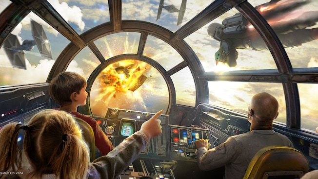 A group of Guests in the cockpit of the Millennium Falcon at at Disney's Hollywood Studios