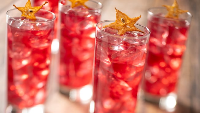 Glasses of the So Many Wishes drink with starfruit garnish at Nineteen Hundred Park Fare