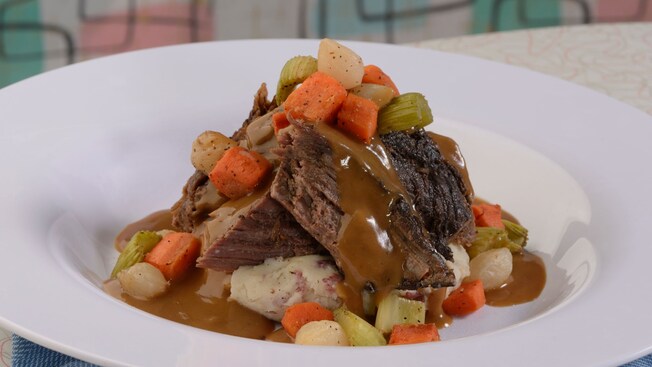 Pot roast with carrots, celery, mashed potatoes and gravy 