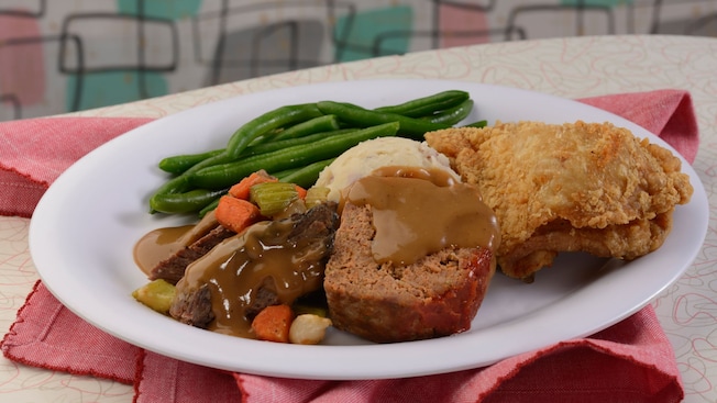 Fried chicken, meatloaf, pot roast with carrots and celery, green beans and mashed potatoes 