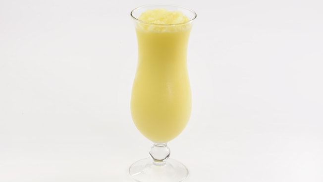 A frozen lemonade drink in a tall glass