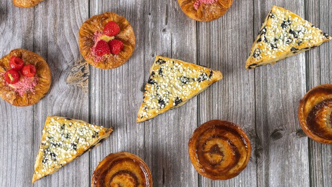 Four rows of croissants and other pastries