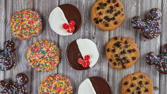 Cookies topped with sprinkles, chocolate chips or frosting