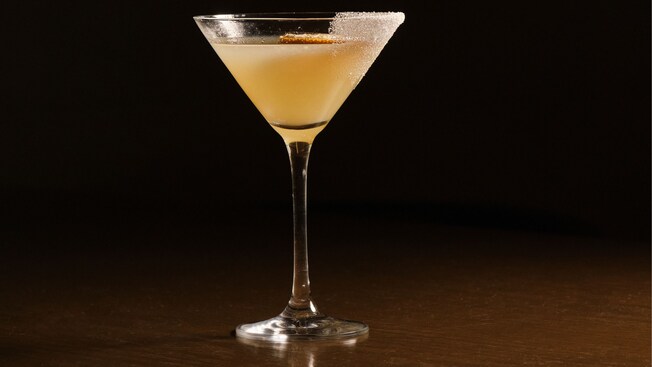 A cocktail in a martini glass