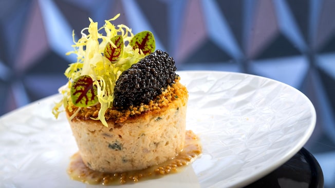 A Jumbo Lump Crab gateau topped with caviar and microgreens