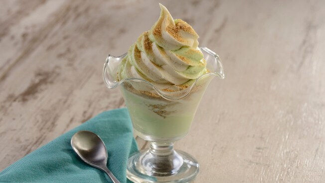 A dish of key lime DOLE Whip, a napkin and a spoon