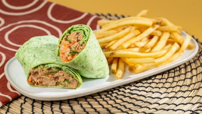 A Harissa Chicken Wrap with fries from Harambe Market at Disney’s Animal Kingdom theme park