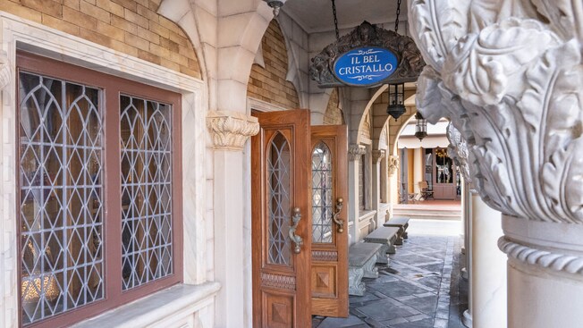 The colonnade of the main entrance and sign to Il Bel Cristallo located in World Showcase at Epcot