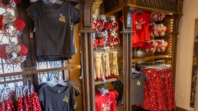 A section of Il Bel Cristallo in World Showcase at Epcot displaying Minnie Mouse ear headbands, shirts and skirts