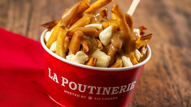 Quebec L’authentique poutine in a cup with cheese curds and gravy