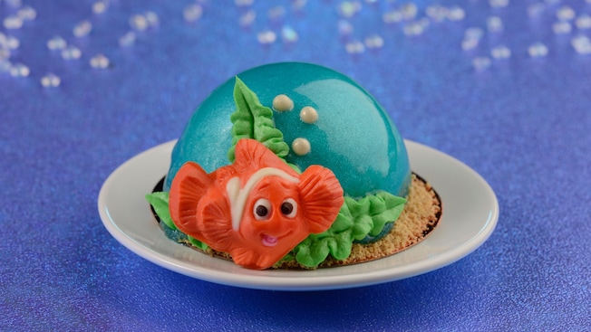 A small cake decorated with an image of Nemo
