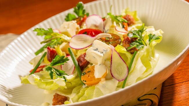 A serving of Steakhouse Wedge Salad from Le Cellier Steakhouse in Epcot