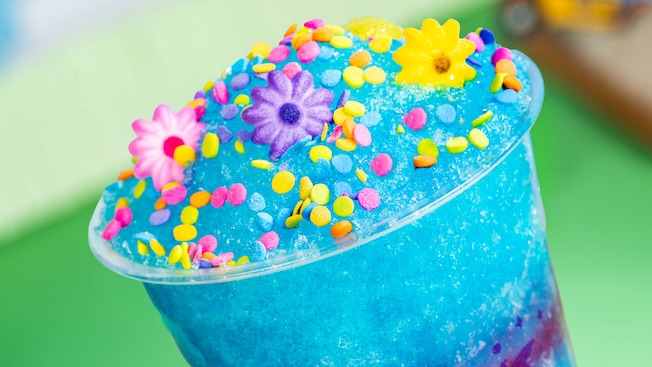 Bluey's Berry Lemonade topped with colorful sprinkles and candy flowers