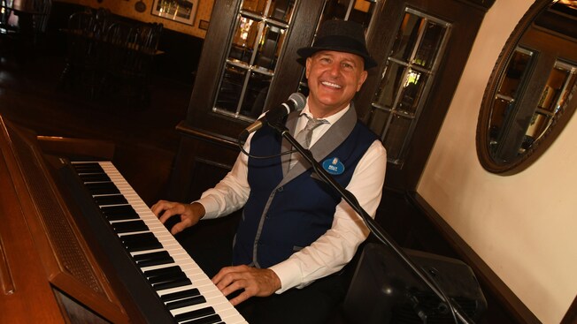 A musician playing the piano at Rose & Crown Dining Room