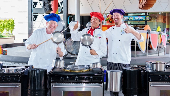 The Jammin’ Chefs holding pots and drumsticks