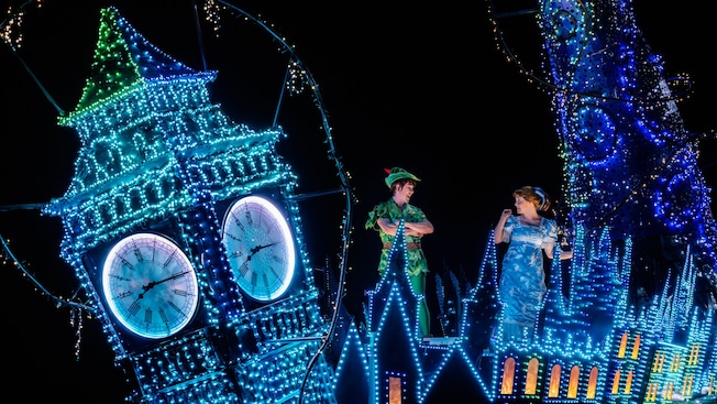 Peter Pan and Wendy on a float in the Disney Starlight, Dream the Night Away parade at Magic Kingdom park