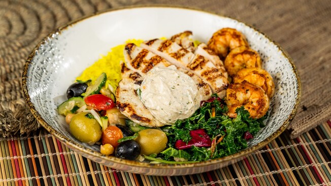 The Combination Bowl, a dish that includes Chermoula spiced shrimp and grilled chicken at The Mara in Disney's Animal Kingdom Lodge