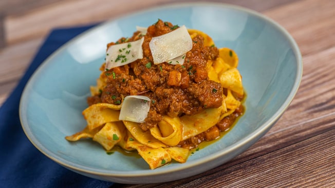 A plate of pasta with slow-braised beef Bolognese sauce, herbs and parmesan cheese from Primo Piatto