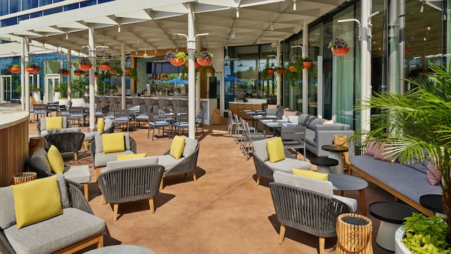 An outdoor bar and lounge area at the Walt Disney World Swan Reserve