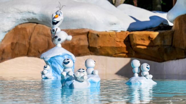 A sculpture of Olaf with little snowmen at Tikes Peak in Disney’s Blizzard Beach Water Park