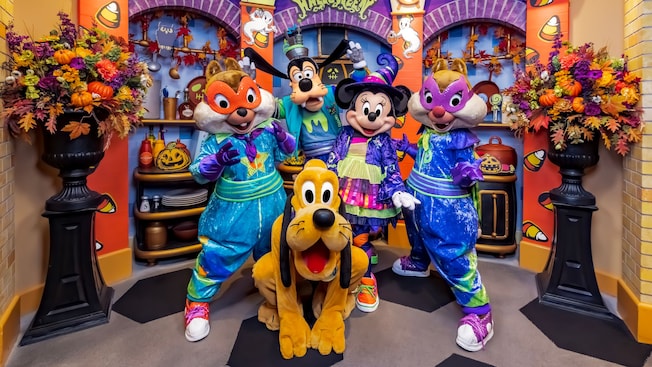 Chip, Goofy, Minnie Mouse, Dale and Pluto wearing Halloween costumes