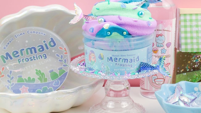 Kawaii Slime Company products displayed in a ceramic clamshell and on a glass cake platter
