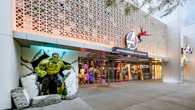 Exterior of Avengers Reserve shop featuring Hulk and Spider Man figures and Super Hero merchandise displays at the Downtown Disney District