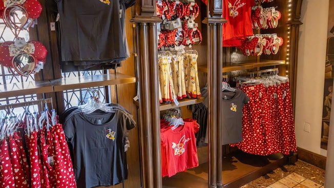 A section of Il Bel Cristallo in World Showcase at Epcot displaying Minnie Mouse ear headbands, shirts and skirts