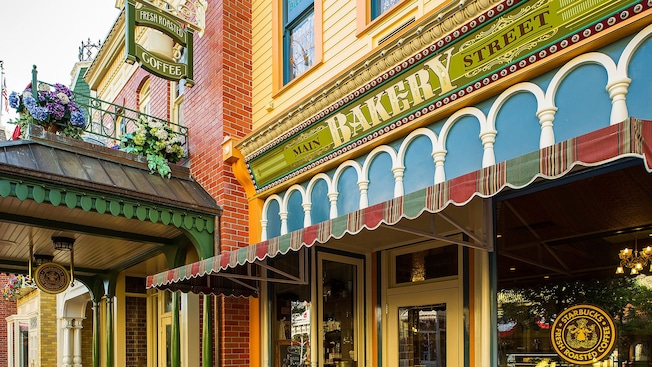 The exterior of Main Street Bakery with a welcoming awning over the glass front door