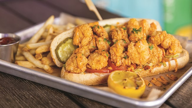 A Shrimp Po Boy Sandwich with French fries from House of Blues Restaurant & Bar