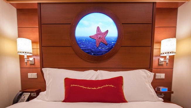 A Magic Porthole in the wood headboard of a bed
