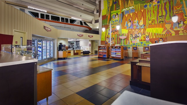 Monorail gliding above the kitchen and cold drink areas at Contempo Café