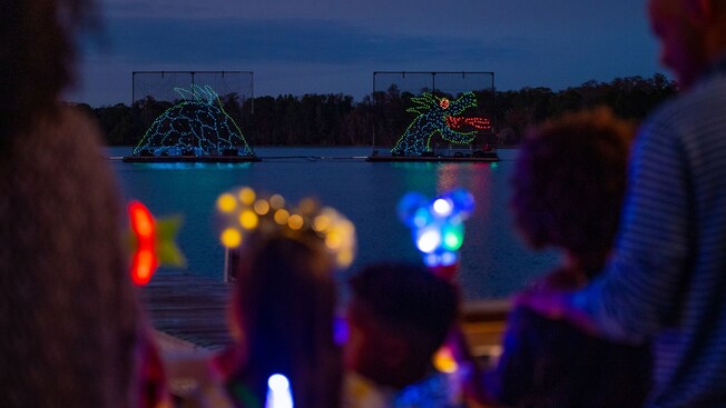 The Electrical Water Pageant on Seven Seas Lagoon, with Cinderella Castle in the background
