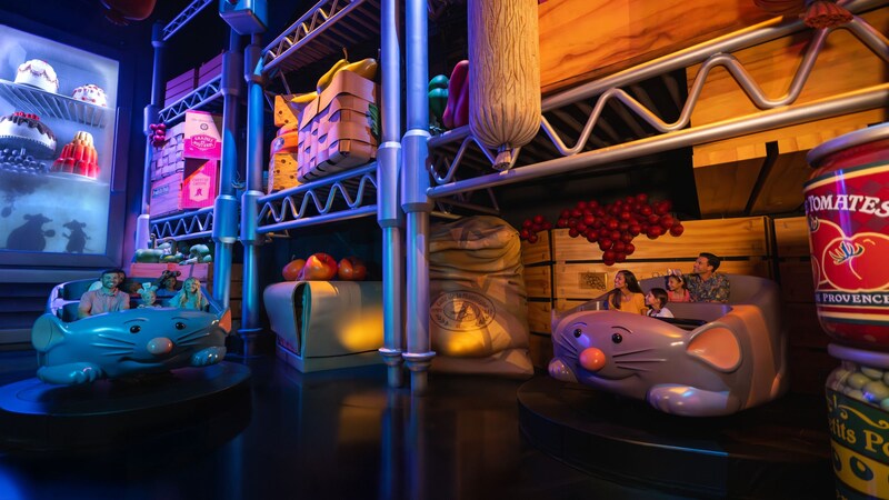2 ride vehicles carry Guests through the giant kitchen of Gusteau’s restaurant on Remy's Ratatouille Adventure