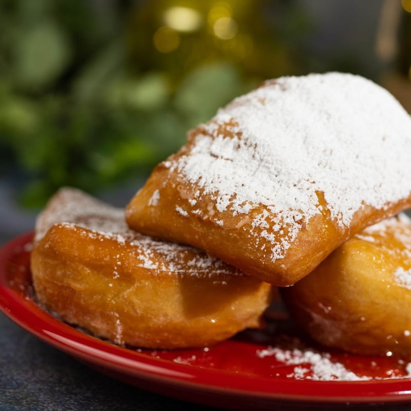 A plate of 3 of Tiana’s Famous Beignets at Golden Oak Outpost restaurant 
