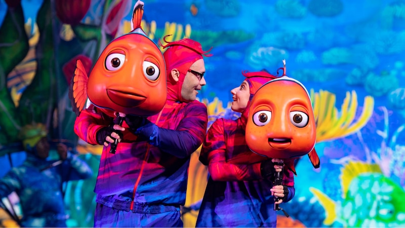 Marlin and Nemo being brought to life through puppeteers in a live stage show