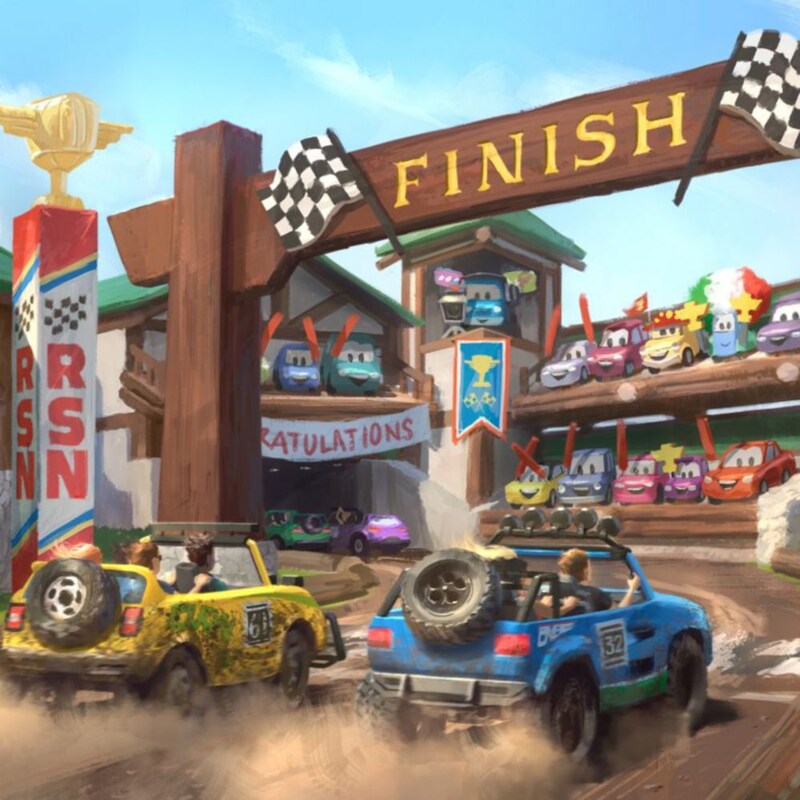 A pair of ride vehicles crossing the finish line on a track in Radiator Springs, while Lightning McQueen and Mater watch the action