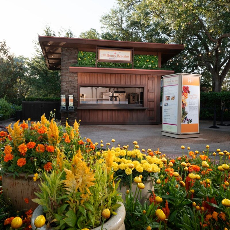 A garden in front of The Honey Beestro at the Epcot International Flower & Garden Festival