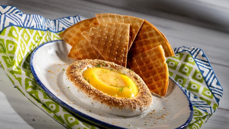 The Deconstructed Key Lime Pie with a mound of key lime custard and cream with thin waffle slices