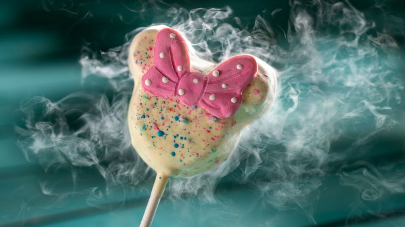 The Liquid Nitrogen Minnie Cake Pop surrounded by liquid nitrogen vapor