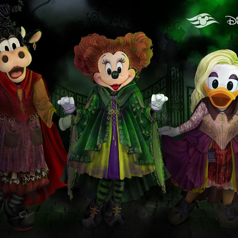 Minnie Mouse, Daisy Duck and Clarabelle Cow dressed as the Sanderson sisters from the Disney film Hocus Pocus